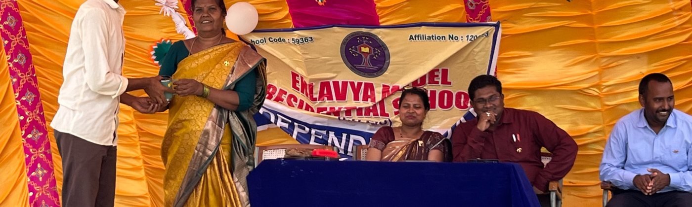 Independence Day programme with school banner